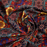 Coton imprimé kaléidoscope floral jaune et rouge