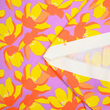 Cotton elastane satin orange flowers purple background