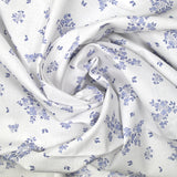 Coton imprimé petite brousse bleu fond blanc