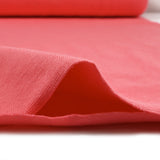 Bord-côte tubulaire rose corail vendu au mètre