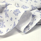 Coton imprimé petite brousse bleu fond blanc