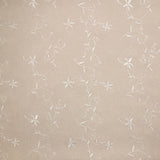 Voile de polyester brodé fleurs et feuillages beige