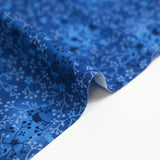 Cotton floral garden print with cobalt blue background