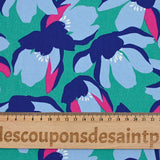 Cotton elastane satin blue flowers mint green background