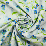 Cotton poplin printed blue flower and green stem sky background