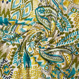 Double-sided quilted viscose ikat and green and ocher cashmere by the meter