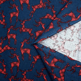 Flanelle de coton imprimée cerfs tartan rouge fond bleu marine