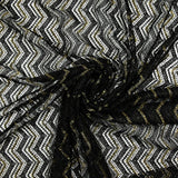 Cordón de poliéster en espiga fondo negro dorado