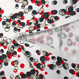 Cotton elastane satin in red bubbles white background