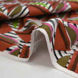 Cotton elastane twill all ways khaki and brick white background