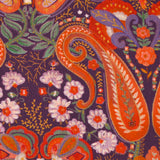 Cotton corduroy with orange paisley print and purple background