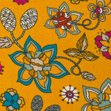 Cotton corduroy printed flowers with old-fashioned mustard background