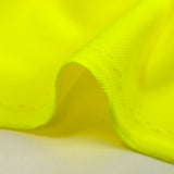 Punto piqué de poliéster amarillo flúor