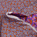 Coton matelassé double face Talia fleurs violet et brique au mètre