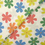 Cotton printed with Ninon flowers on an ecru background
