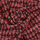 Tweed polialgodón coral fondo negro