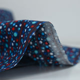 Cotton planet print with red stripes and navy background
