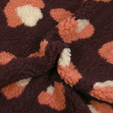 Piel sintética de sherpa de leopardo color salmón y crudo, fondo ciruela oscuro