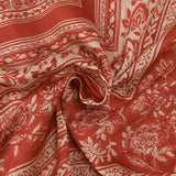 Satin crinkle muslin printed with ecru and brick floral borders