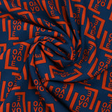 Crêpe georgette imprimé Love rouge feu fond marine