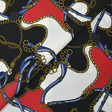 Crepe fino estampado con cadenas y correas negras, blancas y rojas