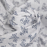 Polycotton poplin printed navy bush white background