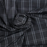 Dyed-woven polycotton poplin with large black background checks