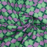 Popeline enduite imprimée pois & trèfle violet fond vert