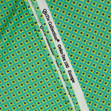 Popelín revestido estampado con flor de rombos, fondo verde limón
