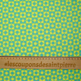 Popeline enduite imprimée champs de fleurs vert fond citron