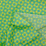 Popeline enduite imprimée champs de fleurs vert fond citron