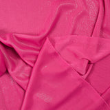 Fine silver Lurex mesh with pink background