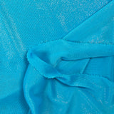 Fine silver Lurex mesh with turquoise background