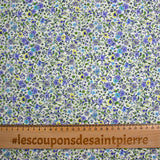 Coton imprimé Giorgia fleurs violet et bleu fond écru au mètre