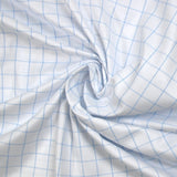 Polycotton poplin woven-dyed with Barnabé blue checks and white background