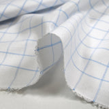 Polycotton poplin woven-dyed with Barnabé blue checks and white background