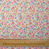 Cotton piqué printed with Sarah's flowers in blue and strawberry on a white background