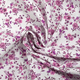 Cotton piqué printed with purple Louna flowers on white background