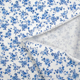 Piqué de coton imprimé les fleurs de Louna bleu fond blanc