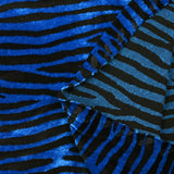 Jersey de terciopelo de cebra negro y azul eléctrico