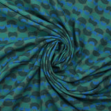 Viscose printed with a unique parenthesis, khaki background