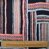 Viscose satin printed with blue and red ropes, navy background