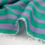 Cotton and viscose printed with turquoise and mauve stripes