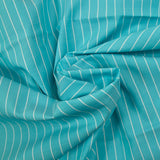 Striped dyed-woven cotton poplin with curaçao background
