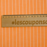 Striped dyed-woven cotton poplin with papaya background