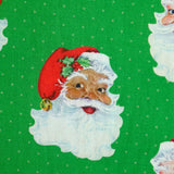 Santa Claus printed cotton with green polka dots