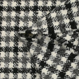 Mezcla de lana de rizo de pata de gallo en negro, gris y blanco roto