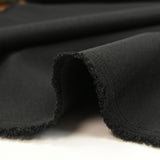 Barbara heat-bonded polyviscose twill crepe black