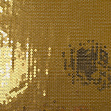 Golden sequins on Mousseline