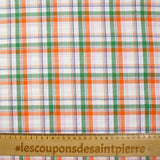 Woven cotton-tight Rowan green and orange white background